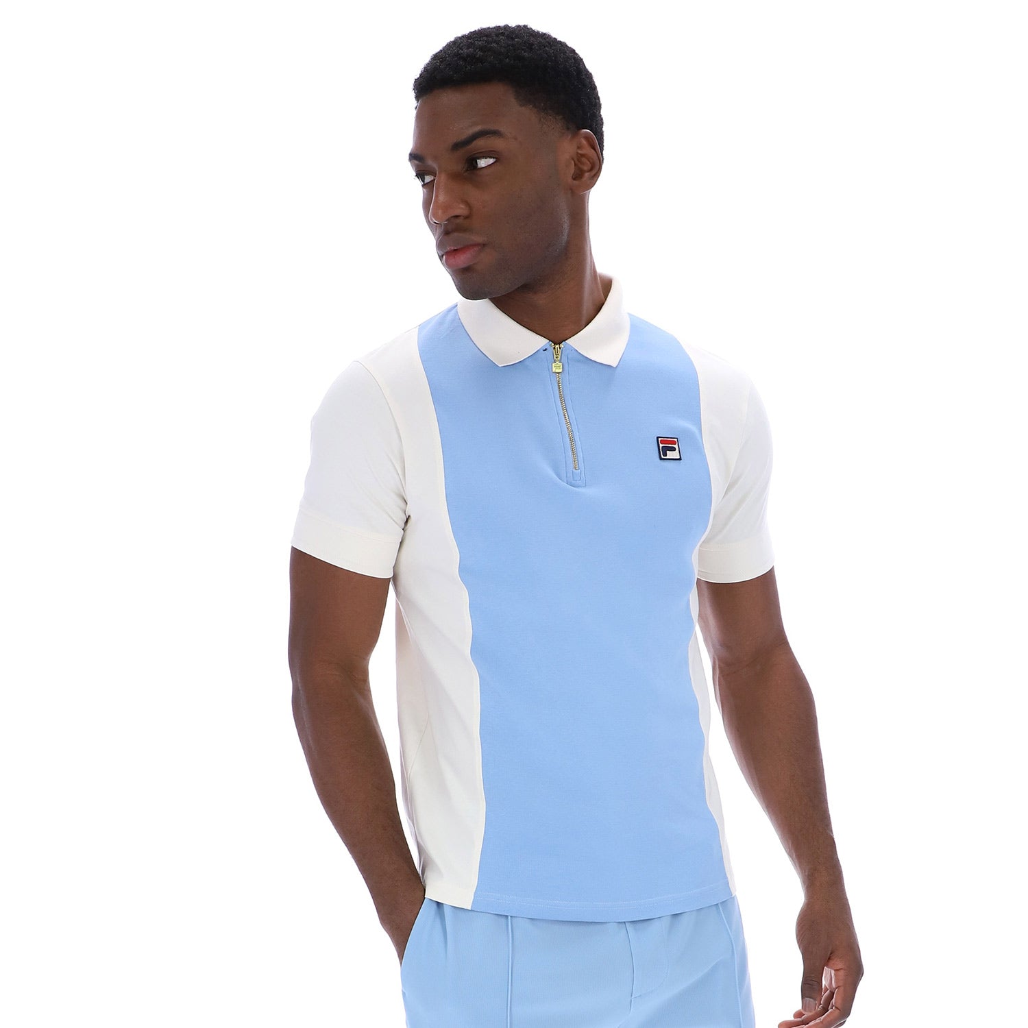 Man wearing Fila Pierro polo shirt in blue and white