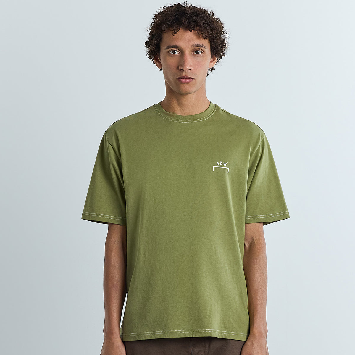 A Man wearing A Cold Wall Moor T Shirt Deep Olive