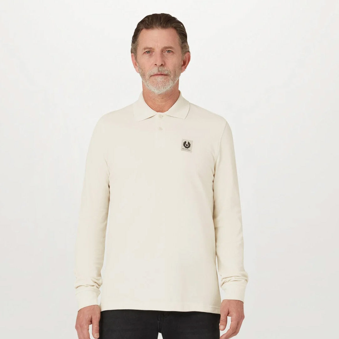 Man wearing Belstaff long sleeve polo in silver birch colour