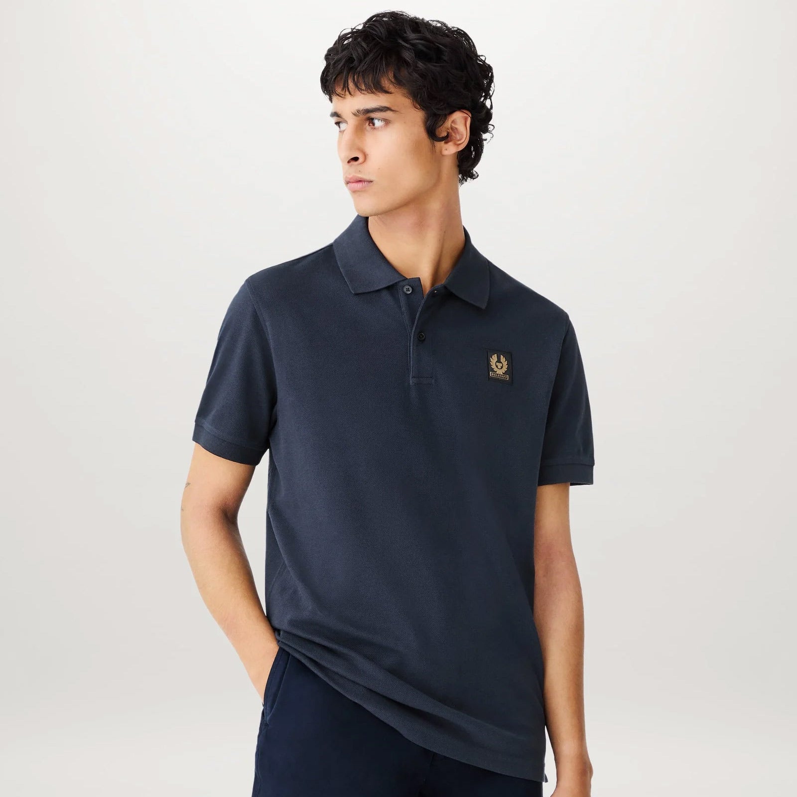 Man wearing Belstaff navy polo shirt