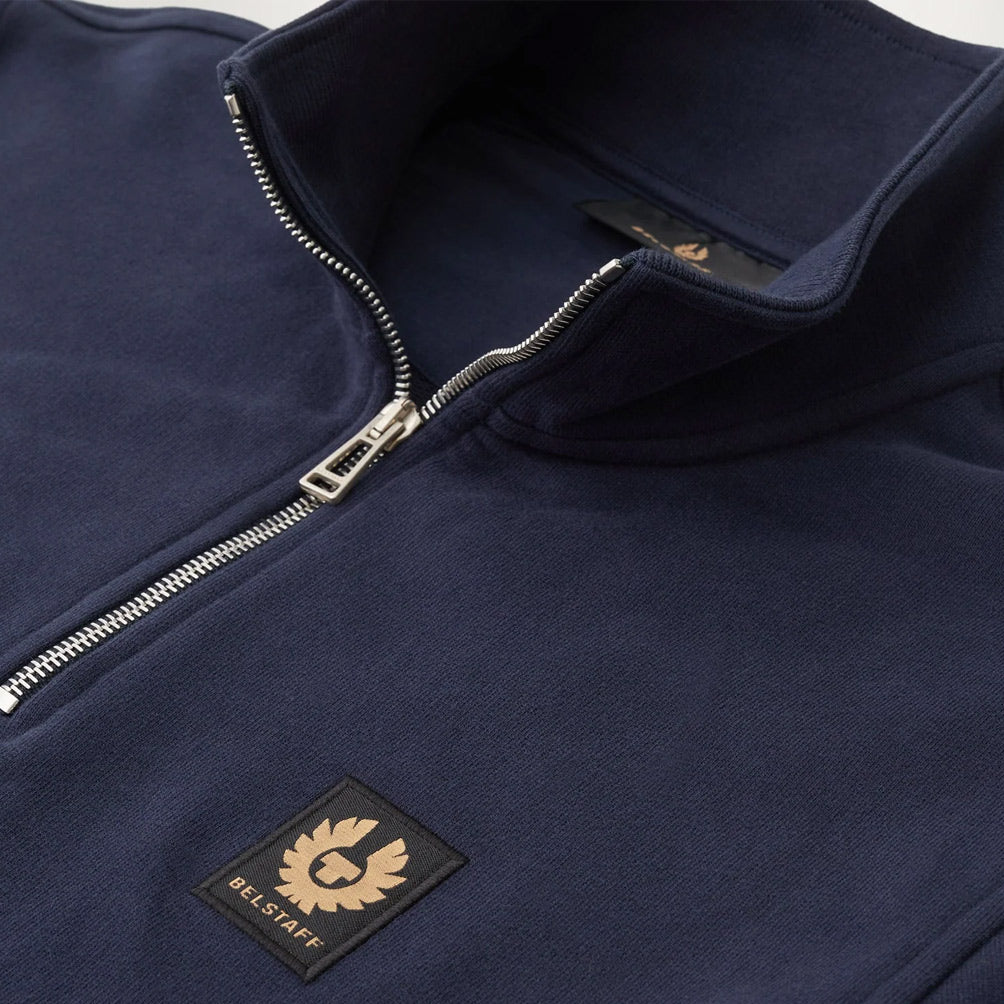 Close up of Belstaf quarter zip in navy