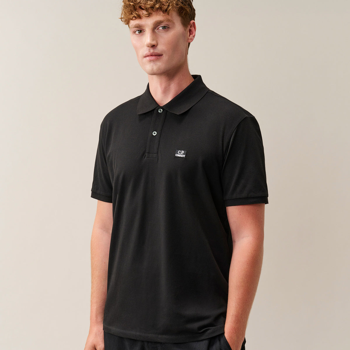 Stretch Piquet Badge Logo Short Sleeve Polo Black