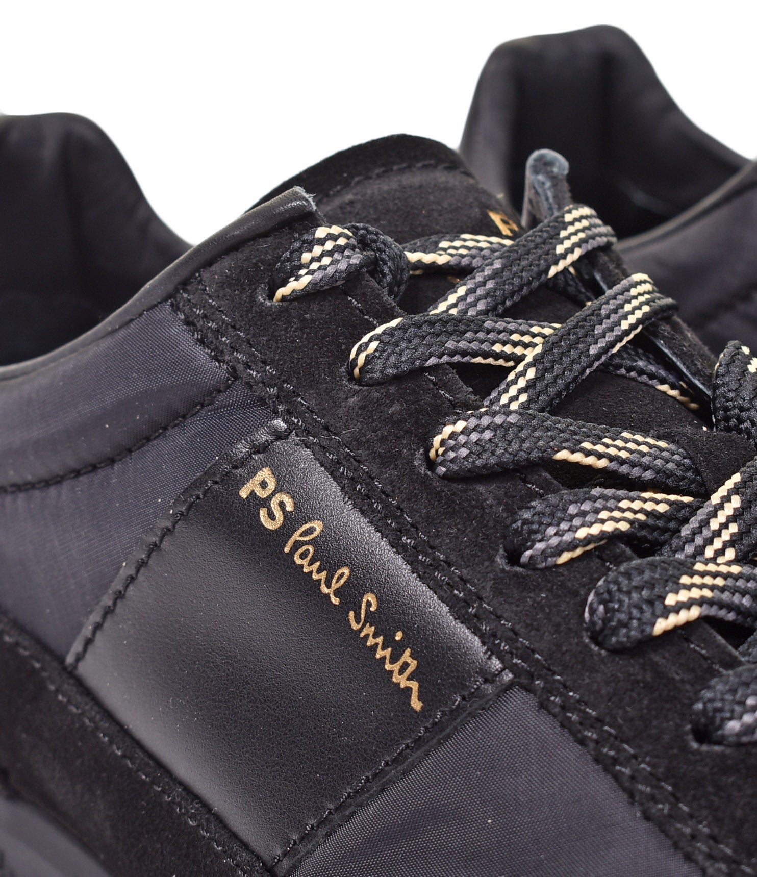 gold detailing on Paul Smith Dover black trainers