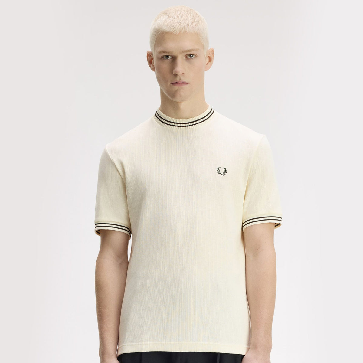 A model wearing a fred perry Ribbed Jersey T Shirt Ecru