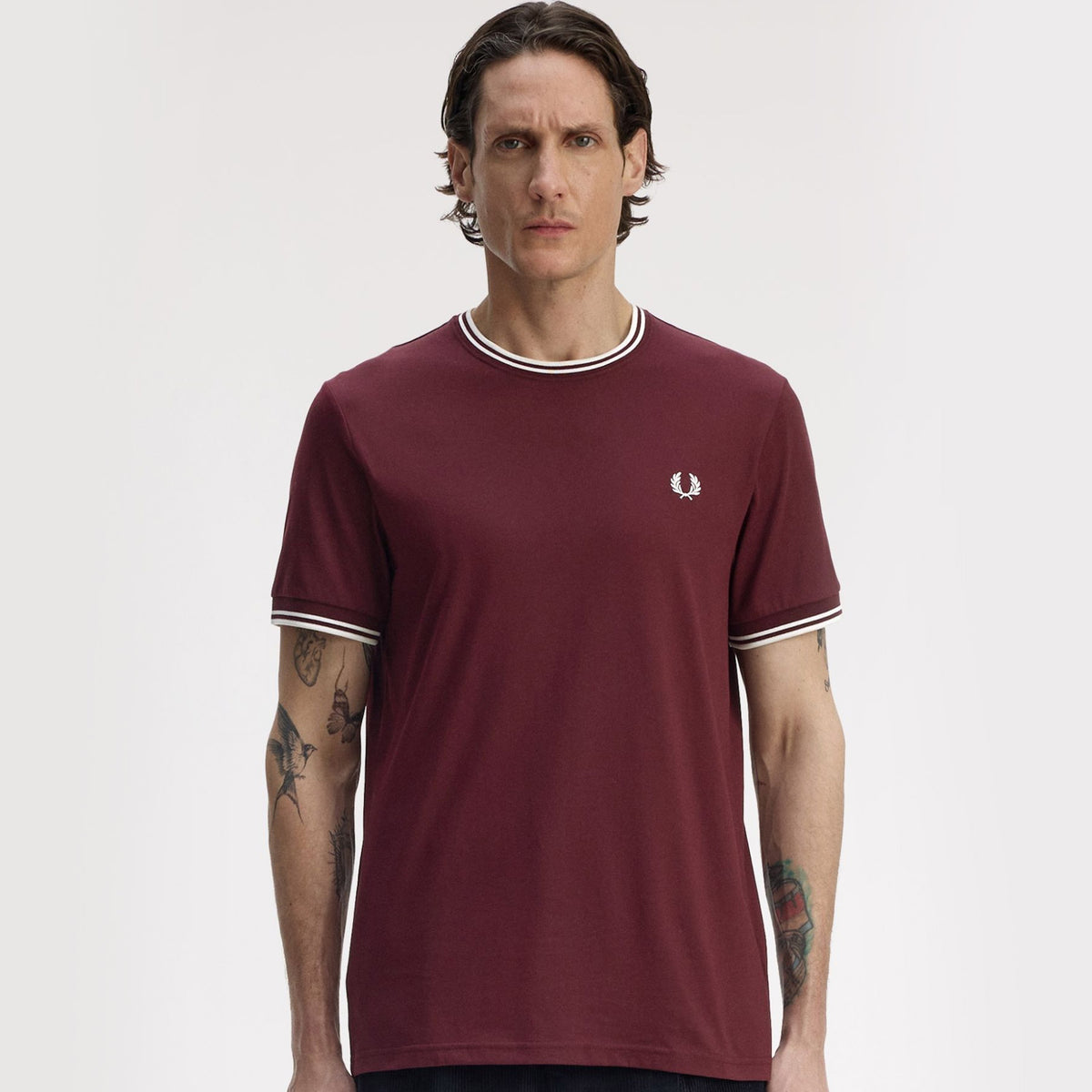 a model wearing fred perry Twin Tipped T Shirt Oxblood / Ecru