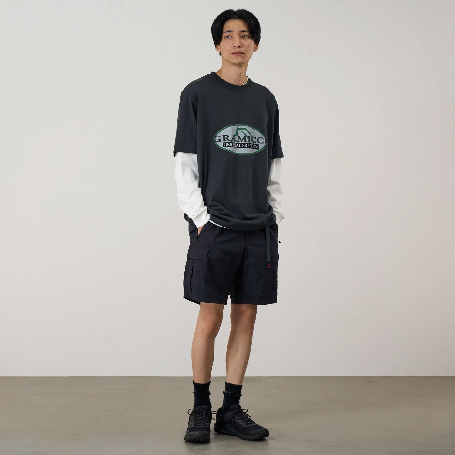 man wearing Gramicci Nylon Explorer Cargo Shorts Black