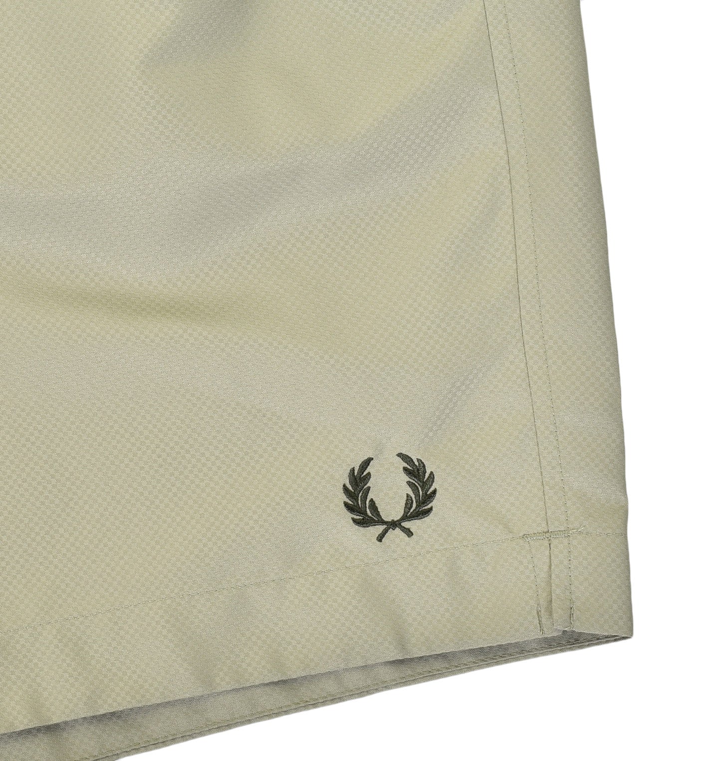 Fred Perry embroidered badge on swim shorts