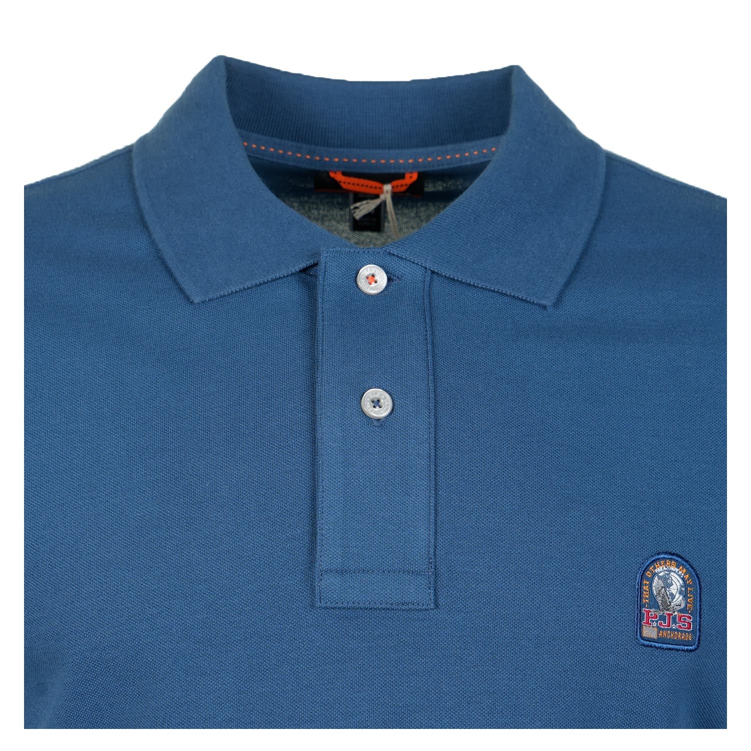 Close up of Wellington Short Sleeve Polo Shirt True Blue collar and buttons