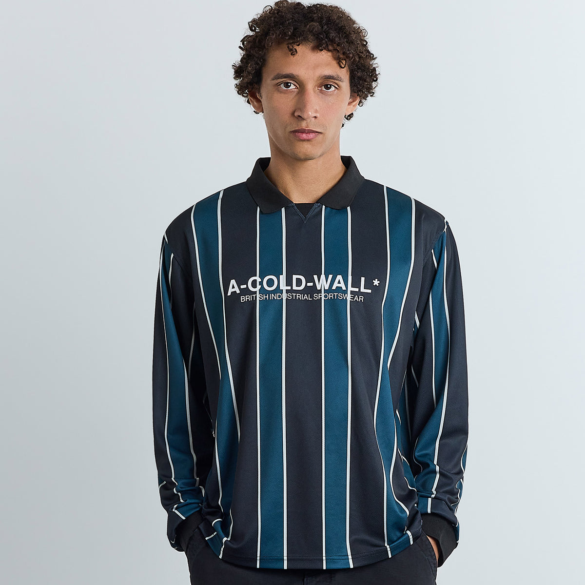 Man wearing A Cold Wall Loft Long Sleeve Polo Midnight