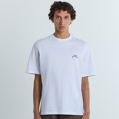 A man wearing a cold wall spin t-shirt in white