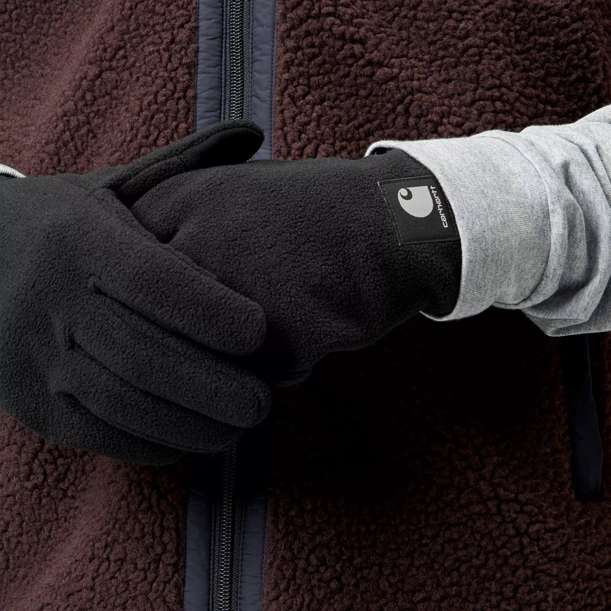 Man wearing Carharrt WIP Blevin Gloves in Black