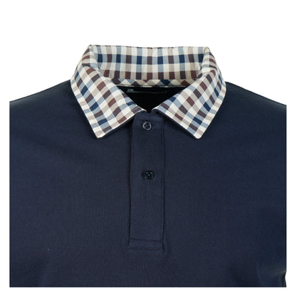 close up of collar and buttons on aquascutum navy polo shirt