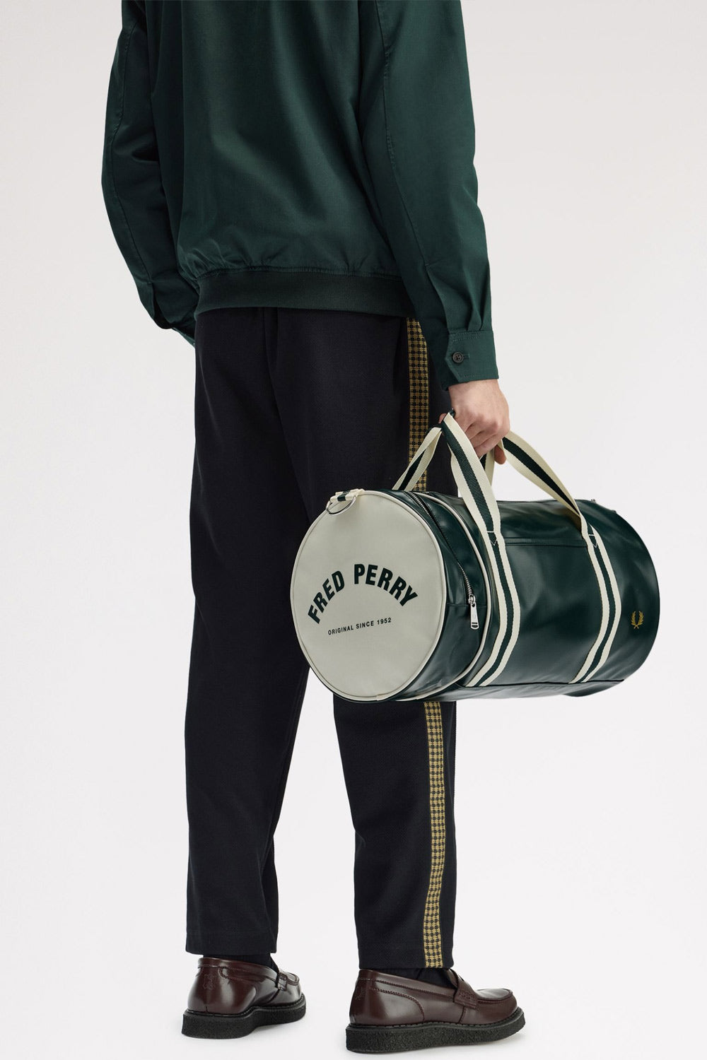 man holding Classic Barrel Bag Grassroots Ecru