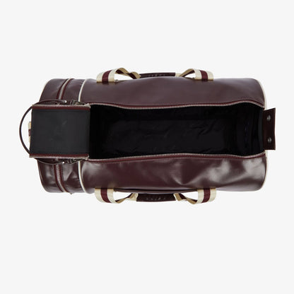 view from above of an opened fred perry Classic Barrel Bag Oxblood Ecru