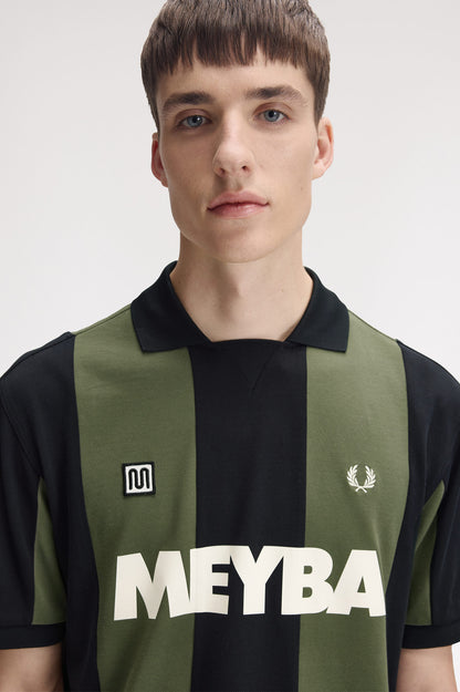 Model wearing Fred Perry Meyba Cut And Sew Polo Shirt Black