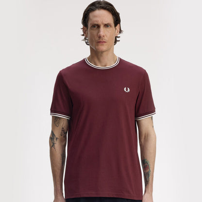 a model wearing fred perry Twin Tipped T Shirt Oxblood / Ecru