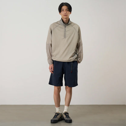 Model wearing Gramicci g-shorts in double navy