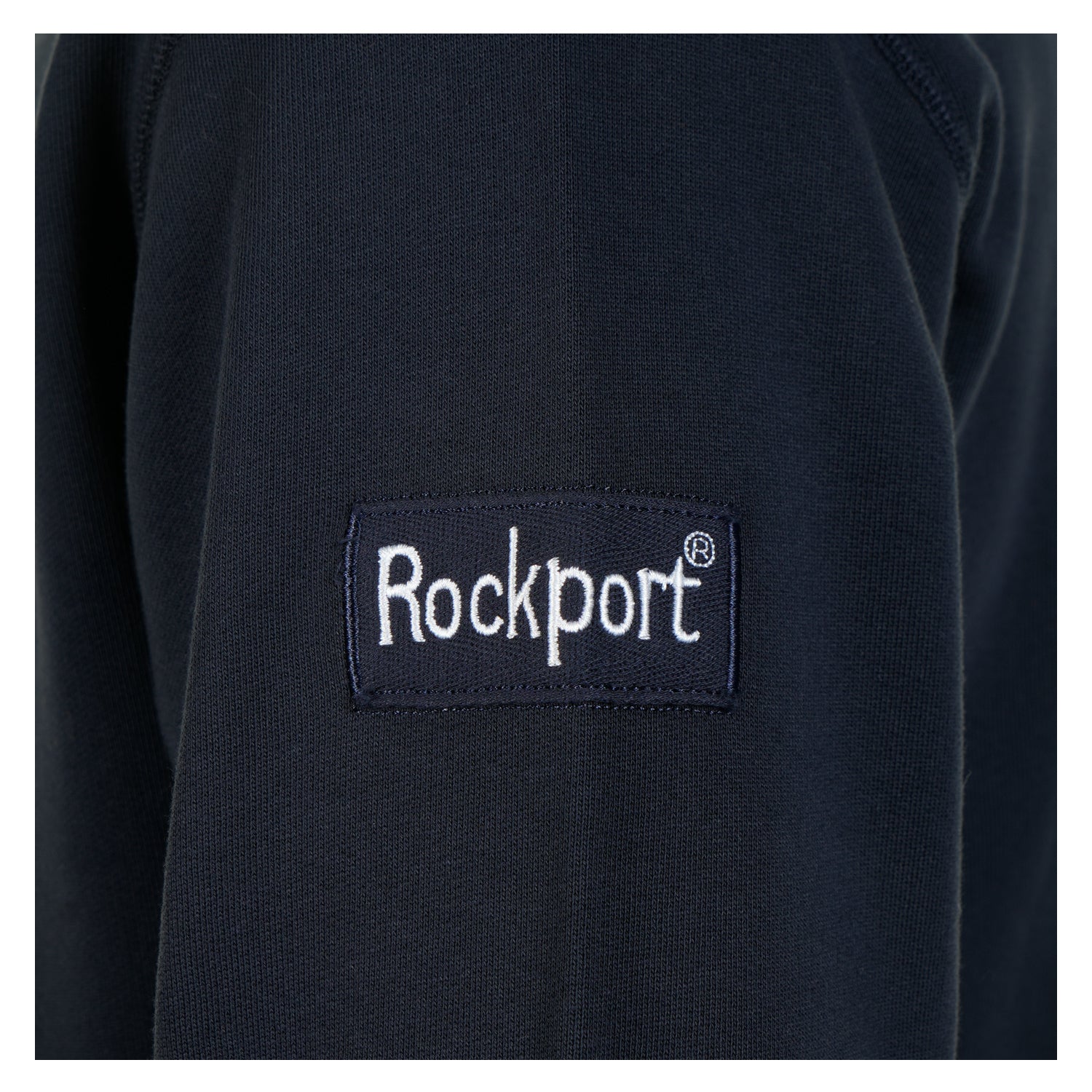 Rockport label on sleeve of New England sweatshirt