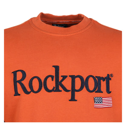Close up of chest branding and neckline of Rockport New England Front Logo Sweatshirt Burnt Orange