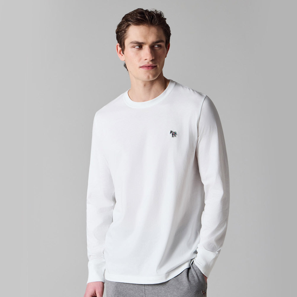 Man wearing Paul Smith long sleeve zebra tee in white