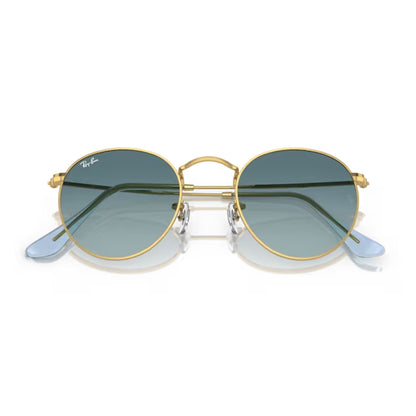 folded pair of Ray-ban Round Metal Flat Lenses Gold / Blue Gradient Grey